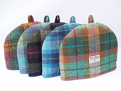 colourful range of harris tweed tea cosies by roses workshop